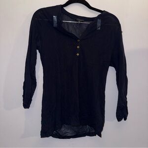 The limited women’s size medium navy blue sheer top